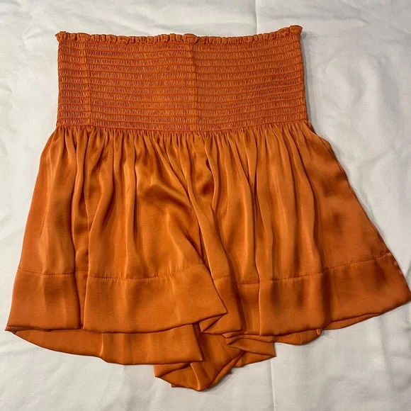 Koch Erica Skirt in Texas Tangerine. Size small. New with removed tag included.